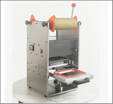 खाद्य ग्रेड स्टेनलेस स्टील शरीर और 6061 एनोडाइज्ड एल्यूमीनियम मोल्ड के साथ इलेक्ट्रिक मैनुअल दूध चाय सील मशीन